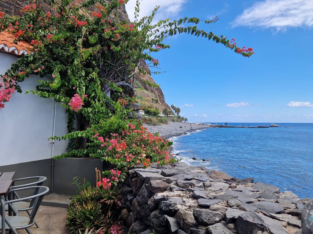faja-dos-padres-stay-boat-house-exterior-sea-view-01